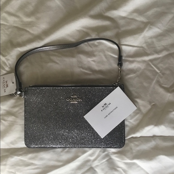 Coach Handbags - 🥳HP🥳NWT Coach Silver Glitter Wristlet